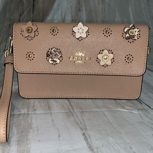 Coach fold over wristlet with daisys